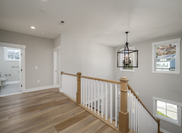 Photo of the upstairs hallway in the Newport floorplan by Foxlane Homes