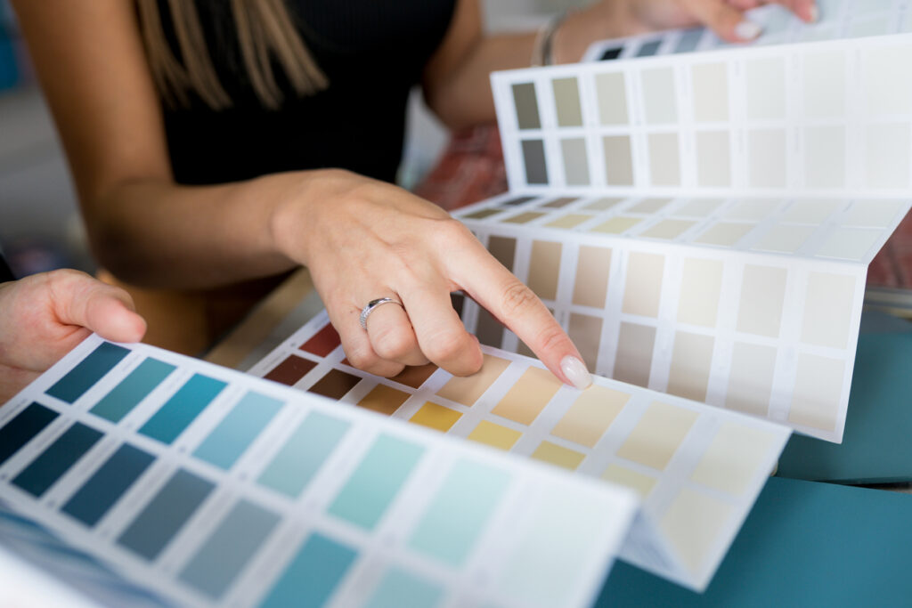 woman looking at paint swatches