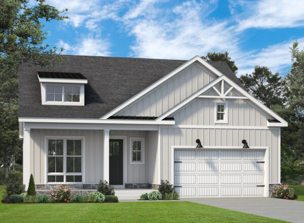 A modern, single-story house with light gray vertical siding, a dark roof, a front porch, and a two-car garage. Green lawn and trees surround the home under a blue sky with clouds.