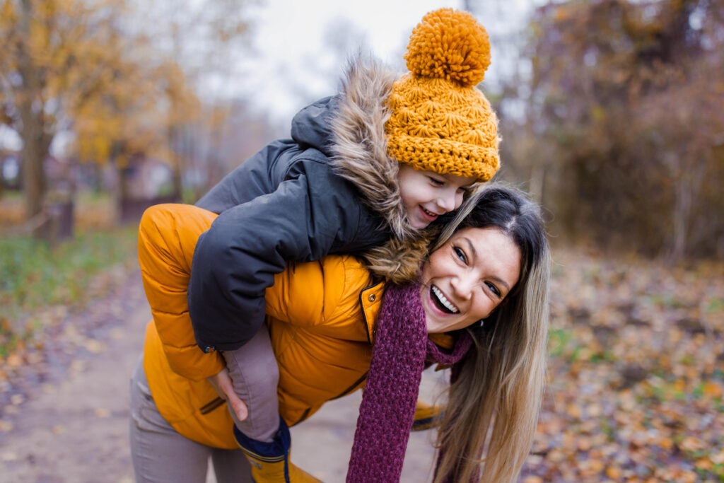 mom and child outside in fall