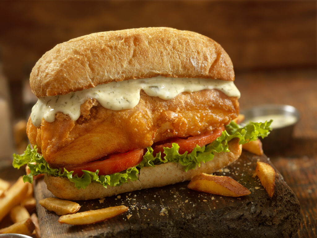 Close up of a fried fish sandwich