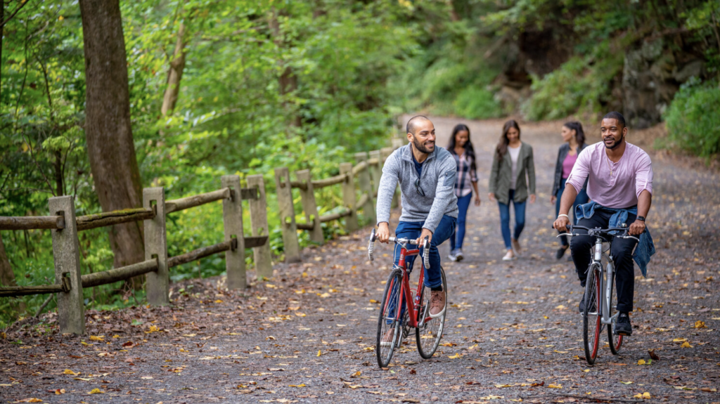 a group of people riding bikes on forbidden drive