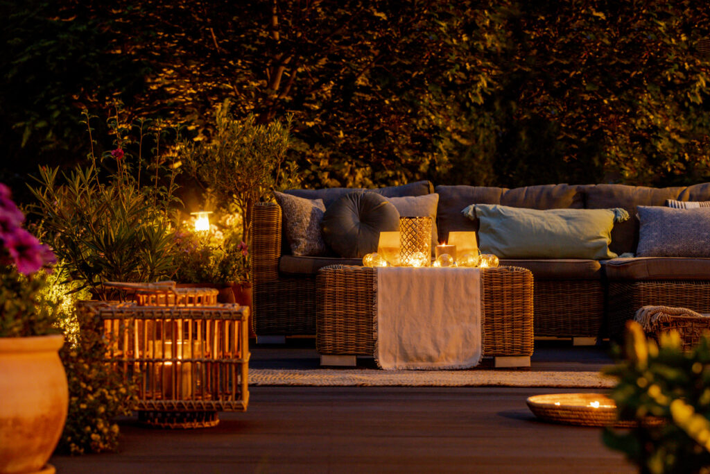 a backyard patio lit up at night