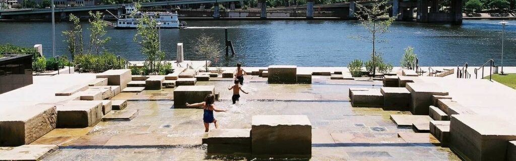 kids playing in the water at north shore water steps