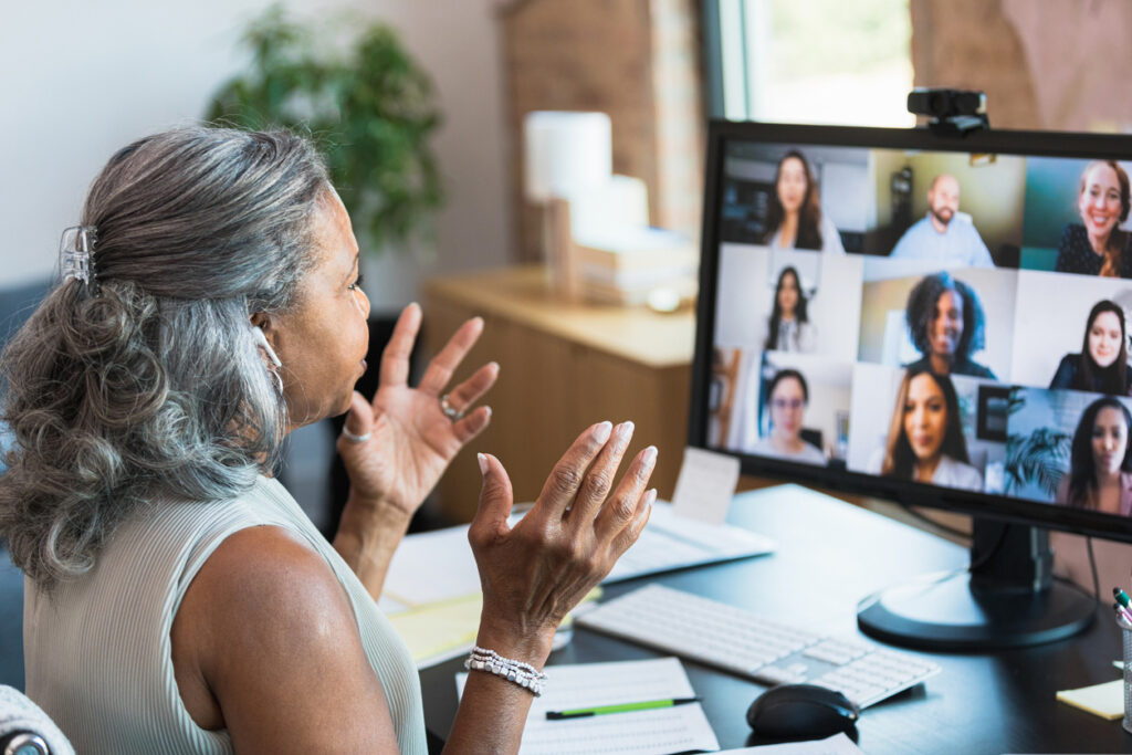 woman on a zoom call in home office