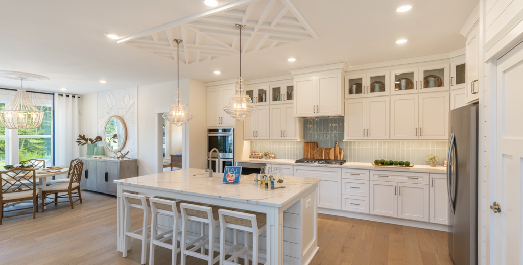 the kitchen of a charleston floor plan  by foxlane homes