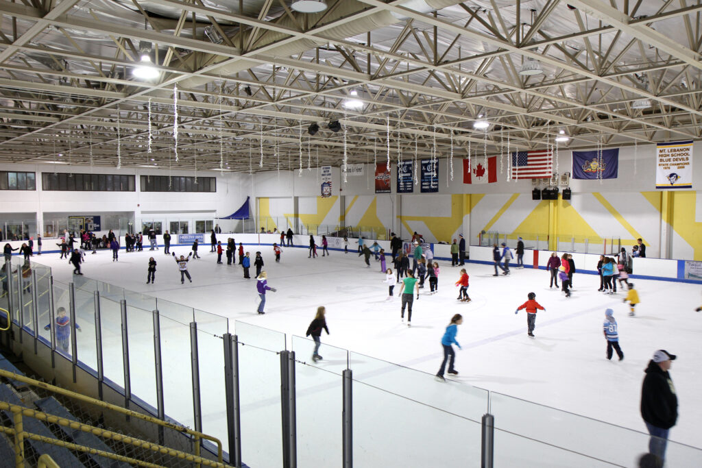 ice skaters enjoying the indoor rink at mt. lebanon ice center in pittsburgh
