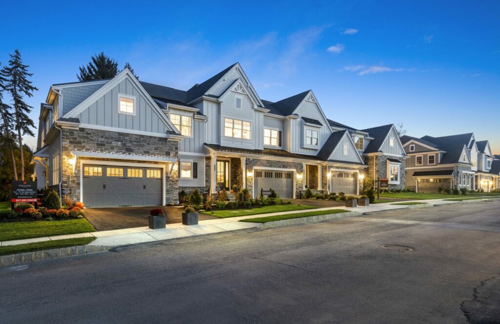 foxlane homes community ironstone at blue bell - exterior of carriage homes at night