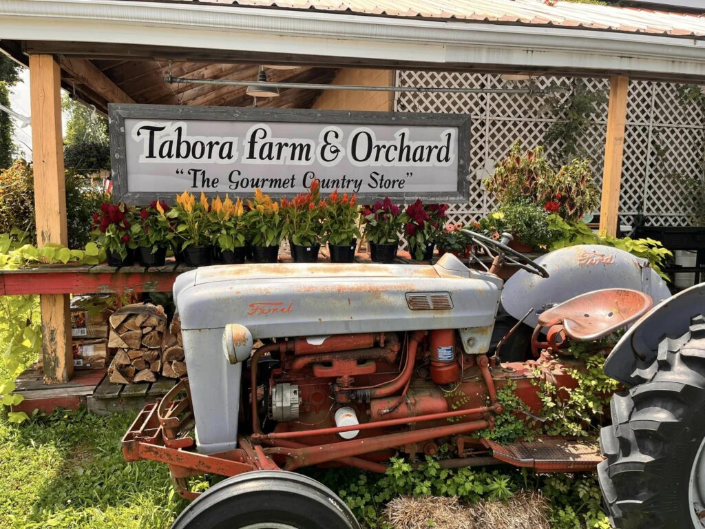 tractor outside of tabora farm and orchard