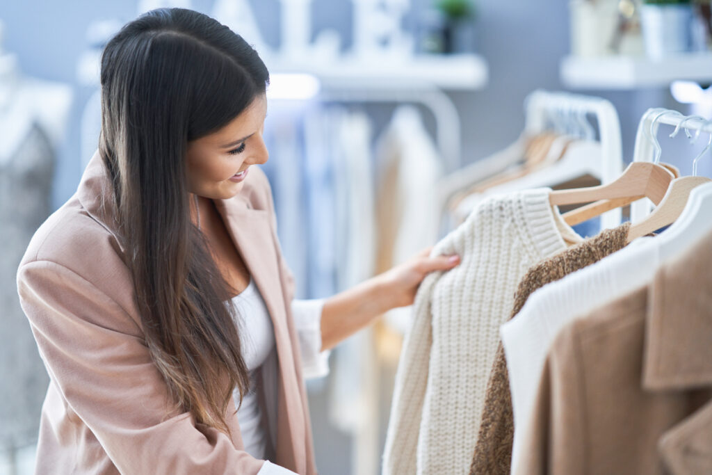 woman browsing clothes in a store