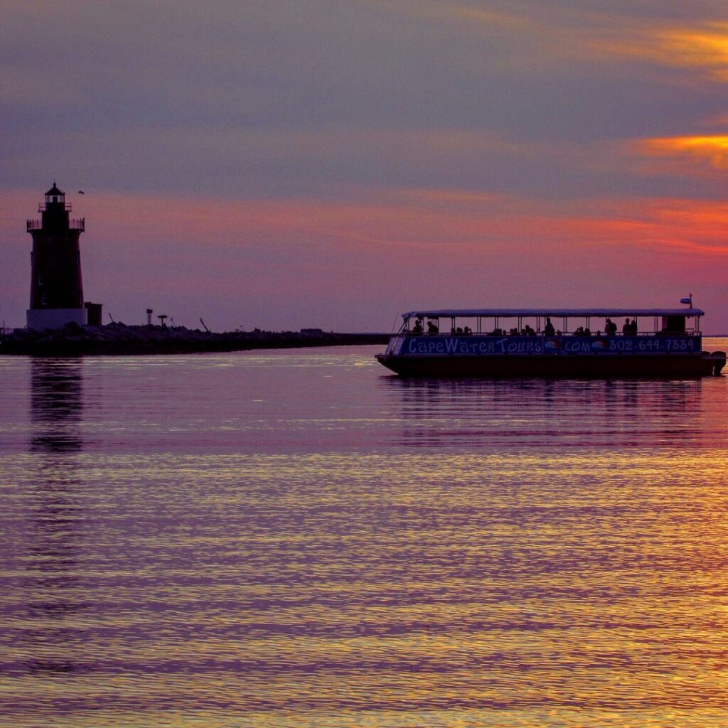 cape water tour taxi boat at sunset