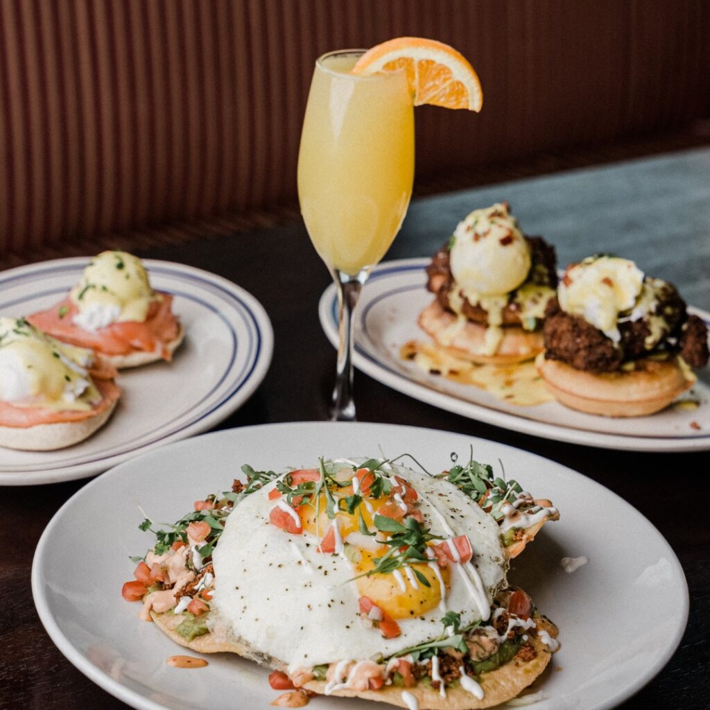 brunch food and a mimosa from Stove & Tap in philly