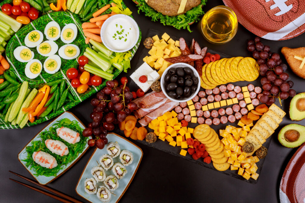 table of football themed party food and snacks