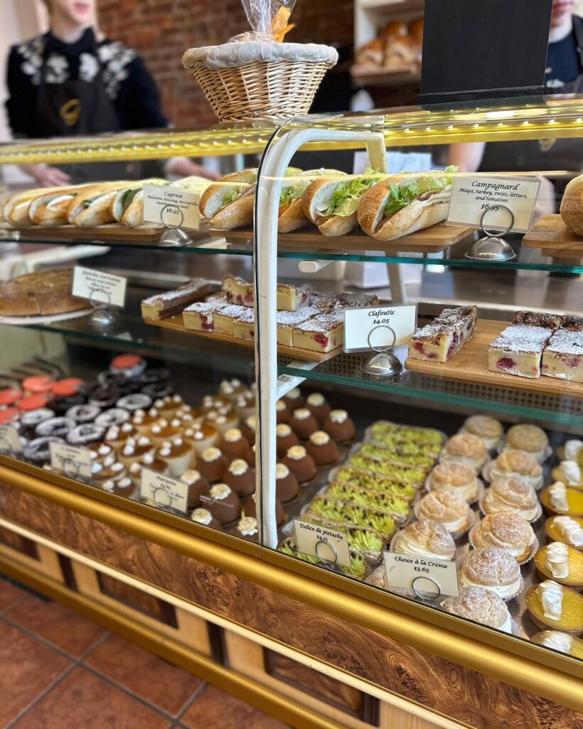 a bakery case of goodies from la gourmandine in pittsburgh