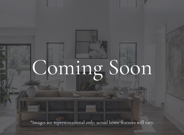 A bright, modern living room with large windows, a neutral-toned sofa, and various decorative pieces. Text overlay reads Coming Soon with a disclaimer about images being representational.