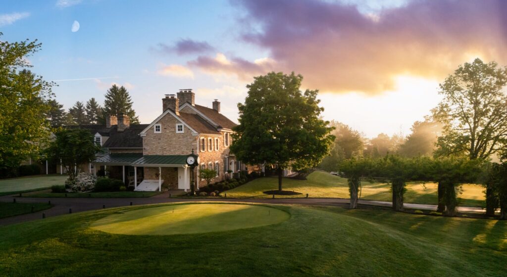 green and clubhouse of lookaway golf club