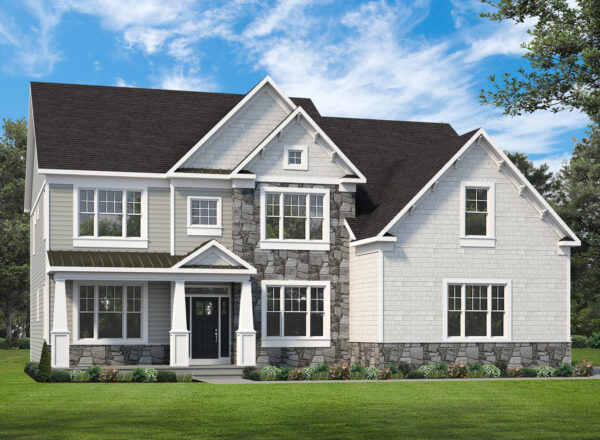 Two-story house with gray siding, stone accents, black roof, white trim, and a covered entryway. The home is surrounded by grass, shrubs, and trees under a partly cloudy sky.